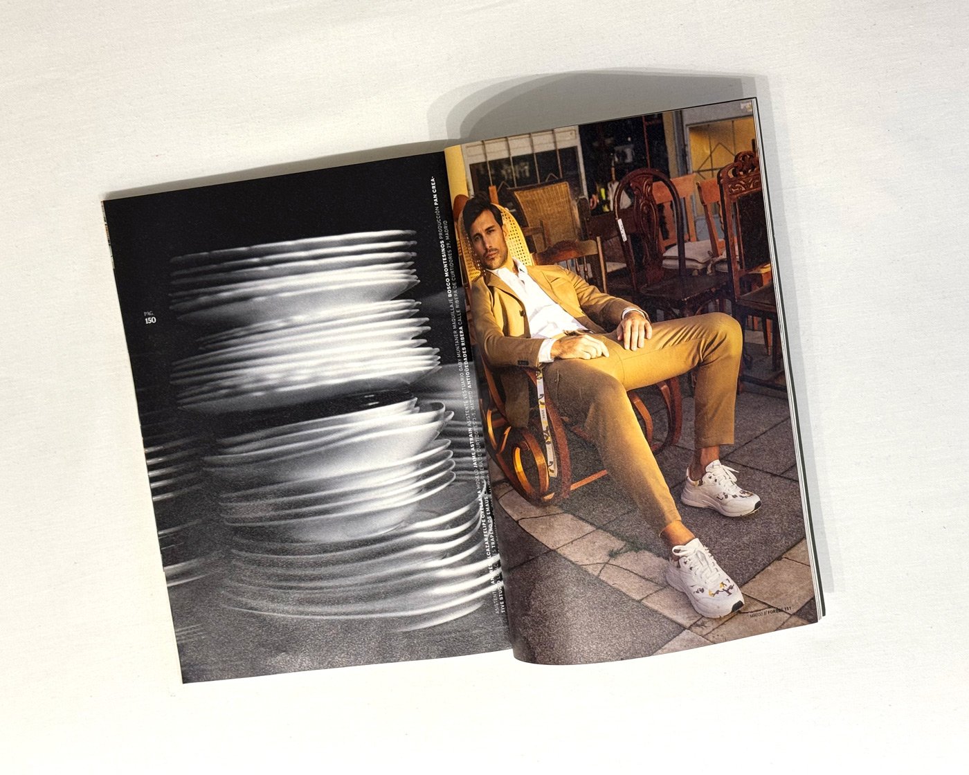 Jaime Astrain seated in tailored menswear during Forbes España fashion editorial styled by Júlia Puñet