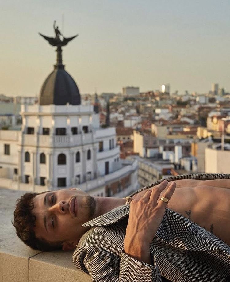 Close-up portrait of Ayax wearing gold jewelry for ICON El País editorial styled by Júlia Puñet